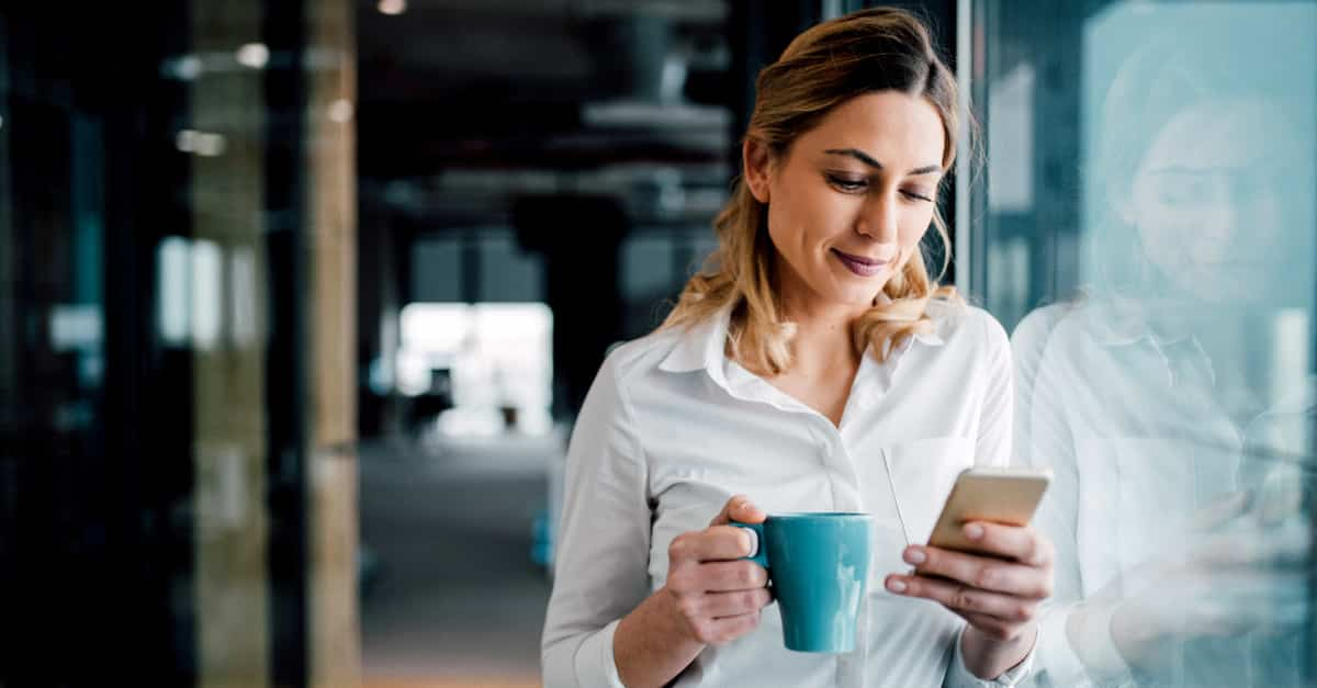 Female manager reads a B2B newsletter