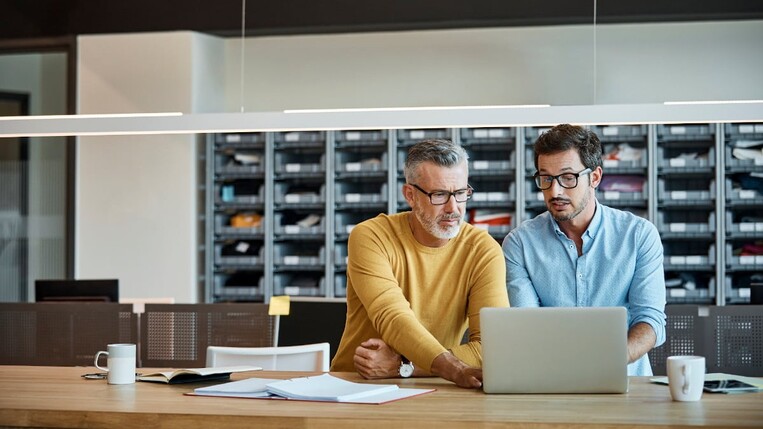 Colleagues discussing a google ads landing pages