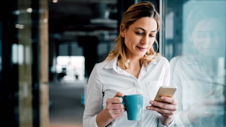 Female manager reading a B2B newsletter