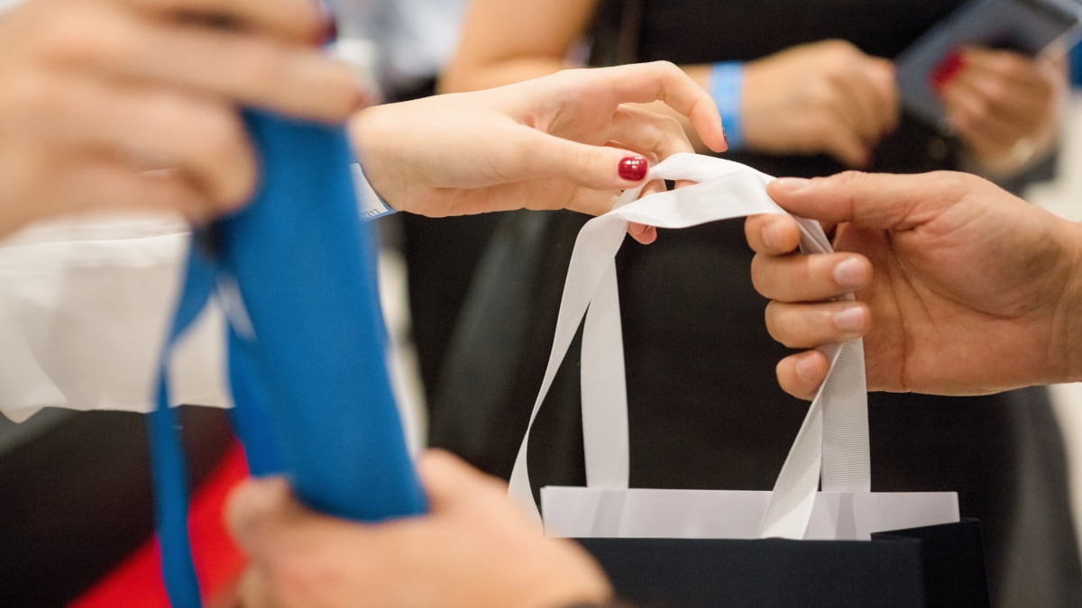 Handling over a goodie bag