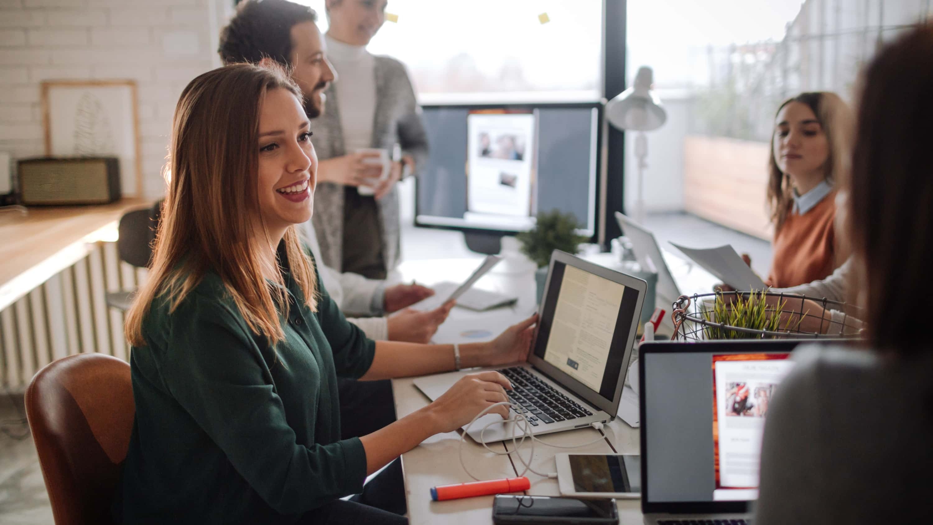 A content marketing manager at her desk