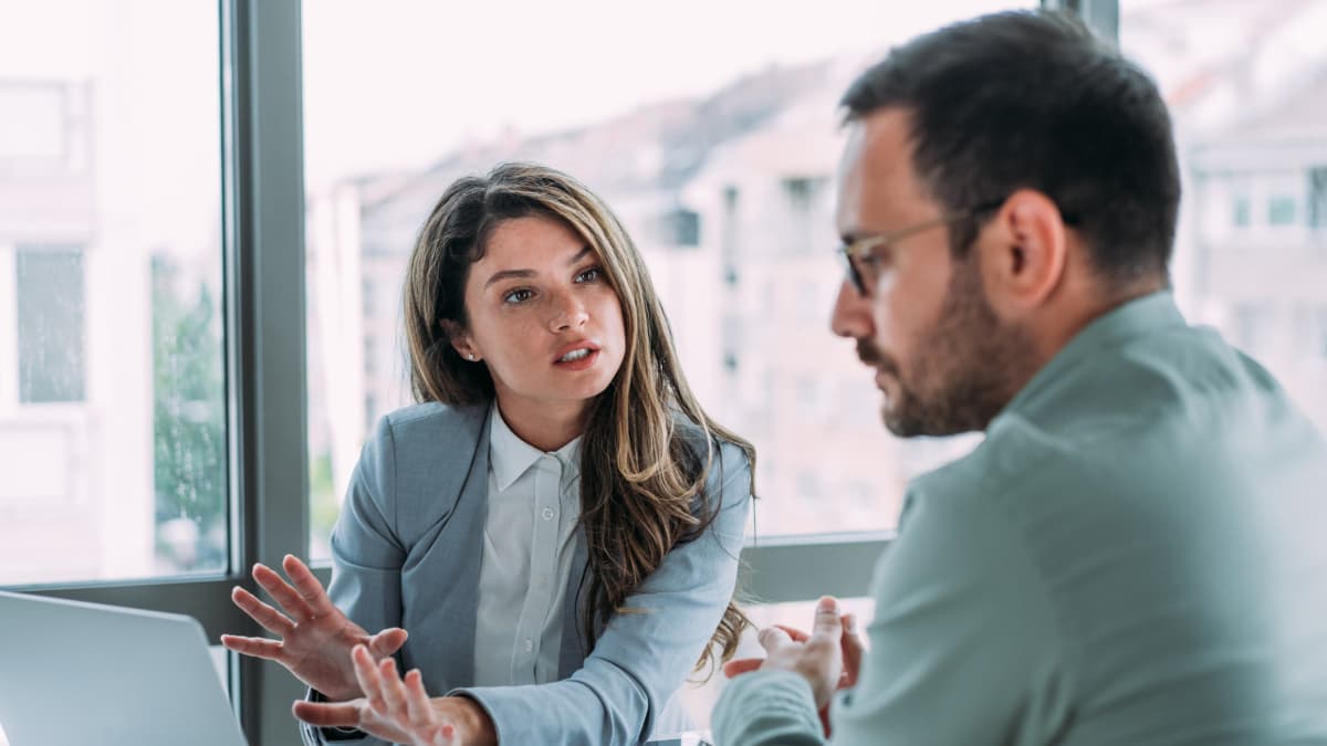 people talking in office